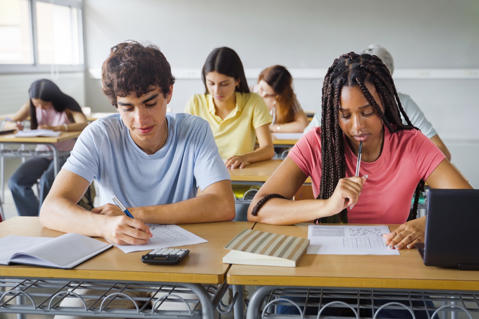Students learning together in a classroom